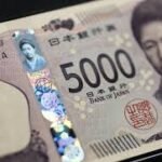 Japanese Yen climbs to one-week top against weaker USD amid divergent BoJ-Fed expectations